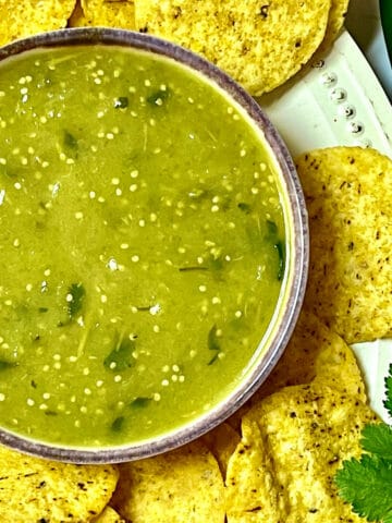 Instant Pot salsa verde surrounded by chips