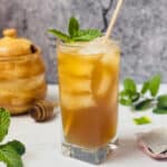 instant pot iced green tea in a cup with mint leaves