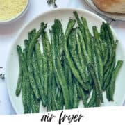 salt and pepper green beans on a white plate
