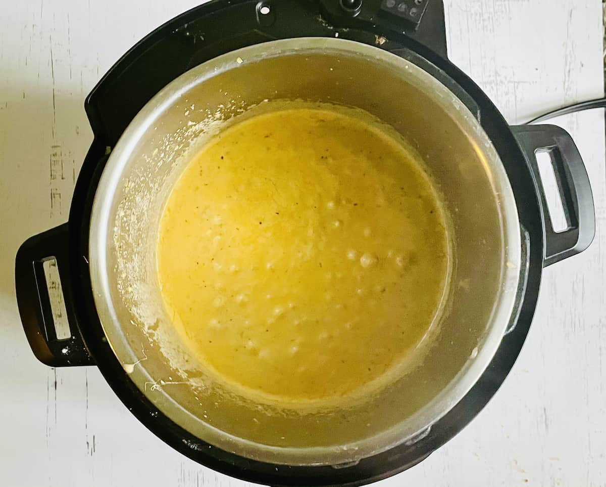 cooked instant pot cheddar jalapeno chicken in a pressure cooker