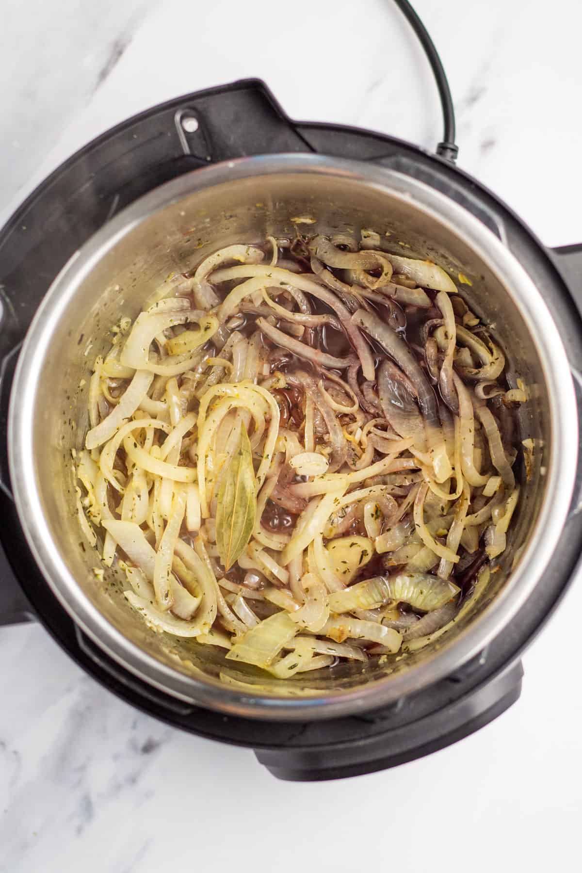 onions and red wine in an instant pot