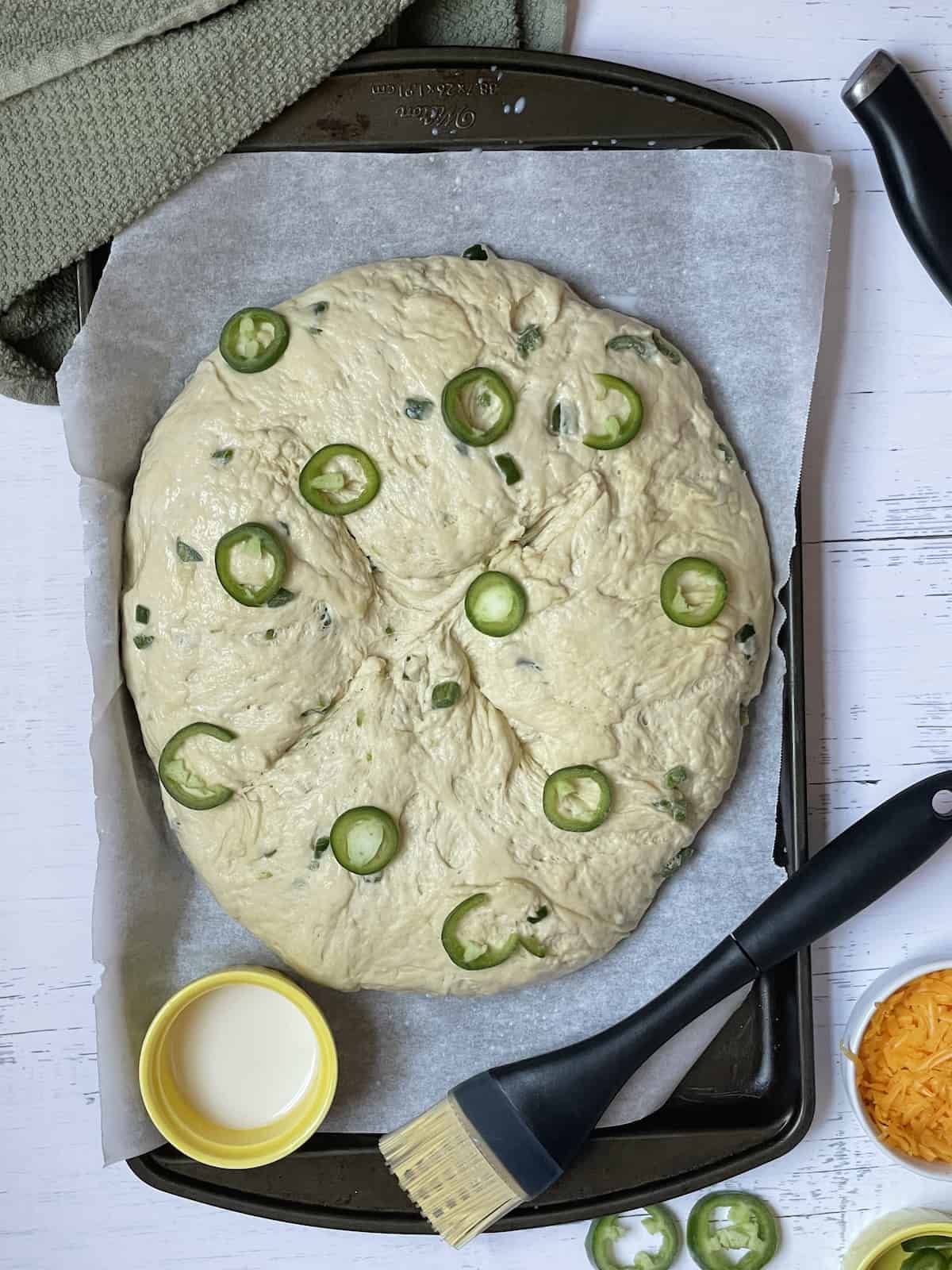 jalapenos topped on dough