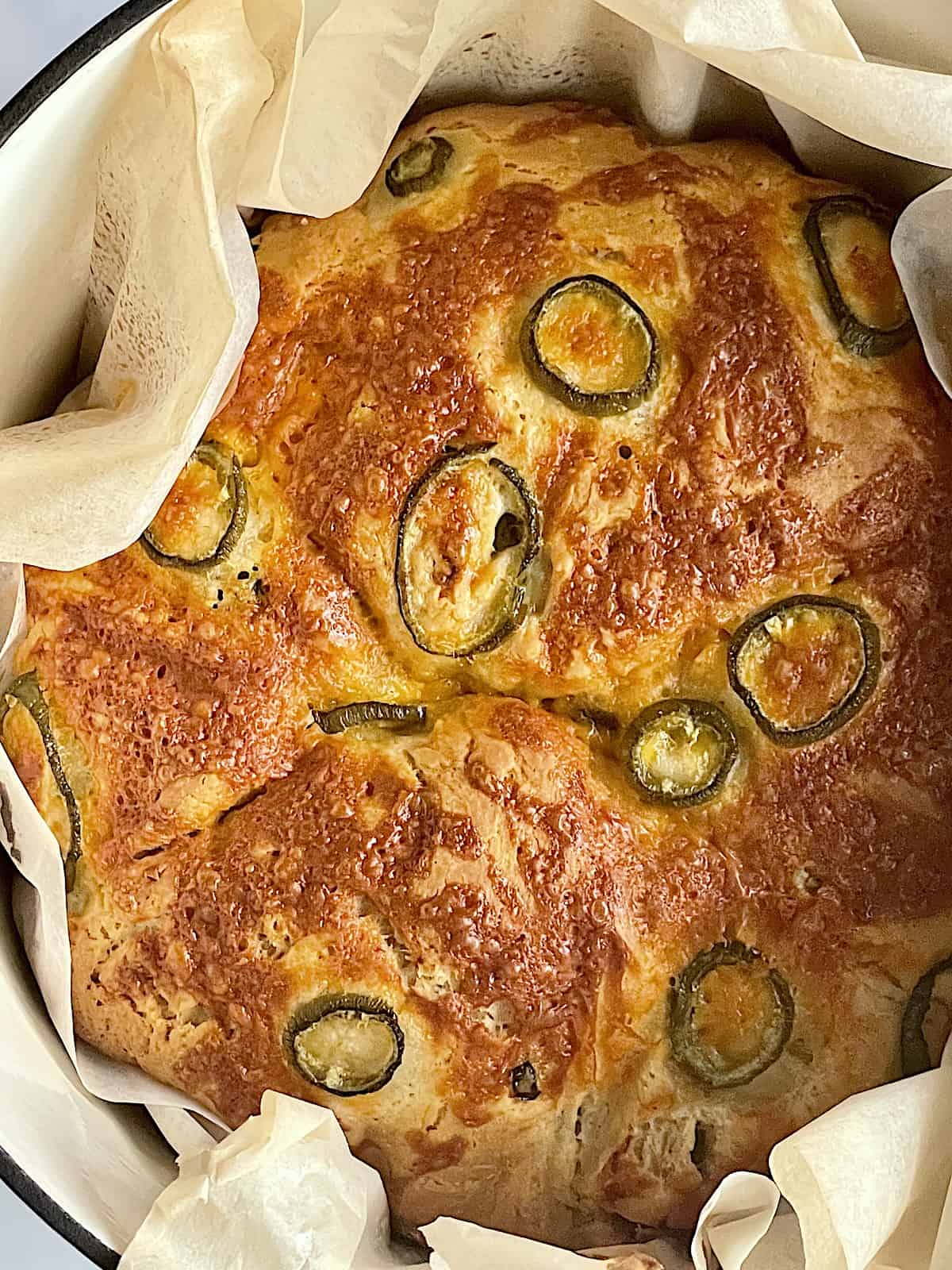 close up of dutch oven cheddar jalapeno bread
