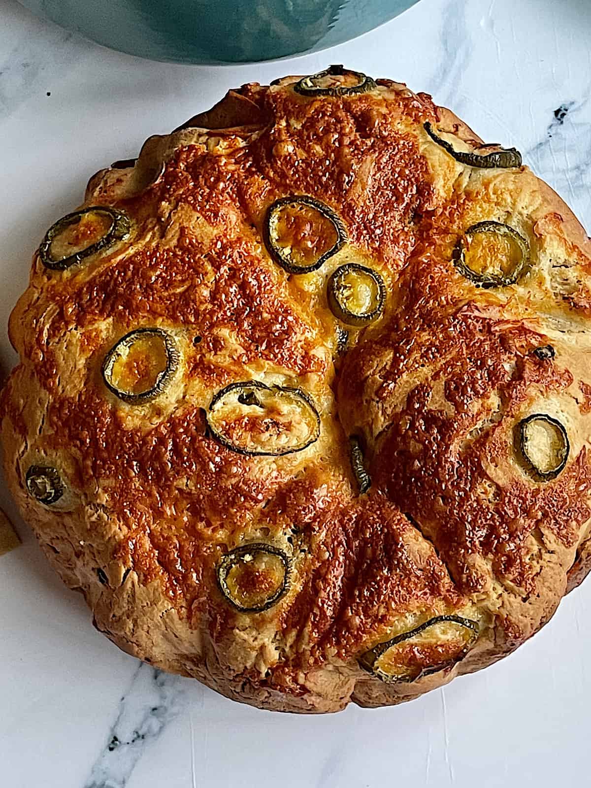 cheddar jalapeno bread on a white background