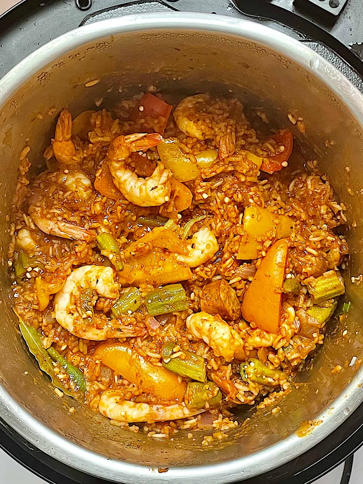 pressure cooked jambalaya with shrimp and mixed in the pot