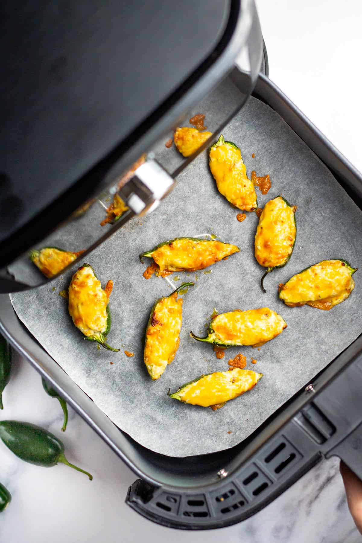 air fried jalapeno poppers cooked in the basket