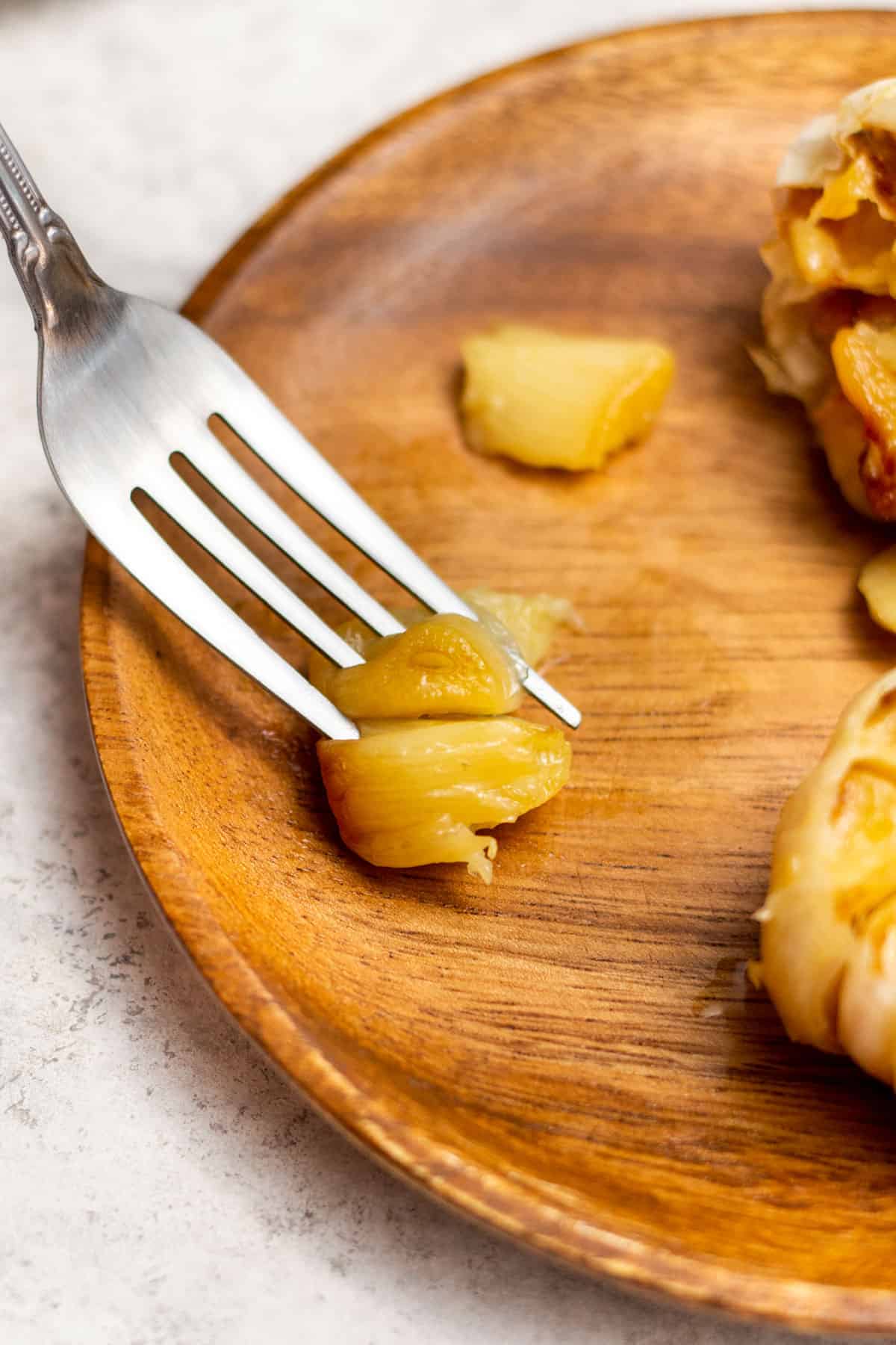 roasted garlic on a fork