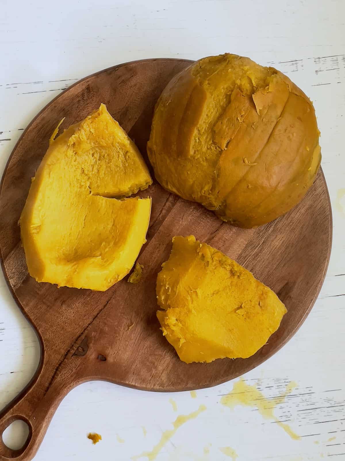 peeled and cut instant pot pumpkin on a cutting board