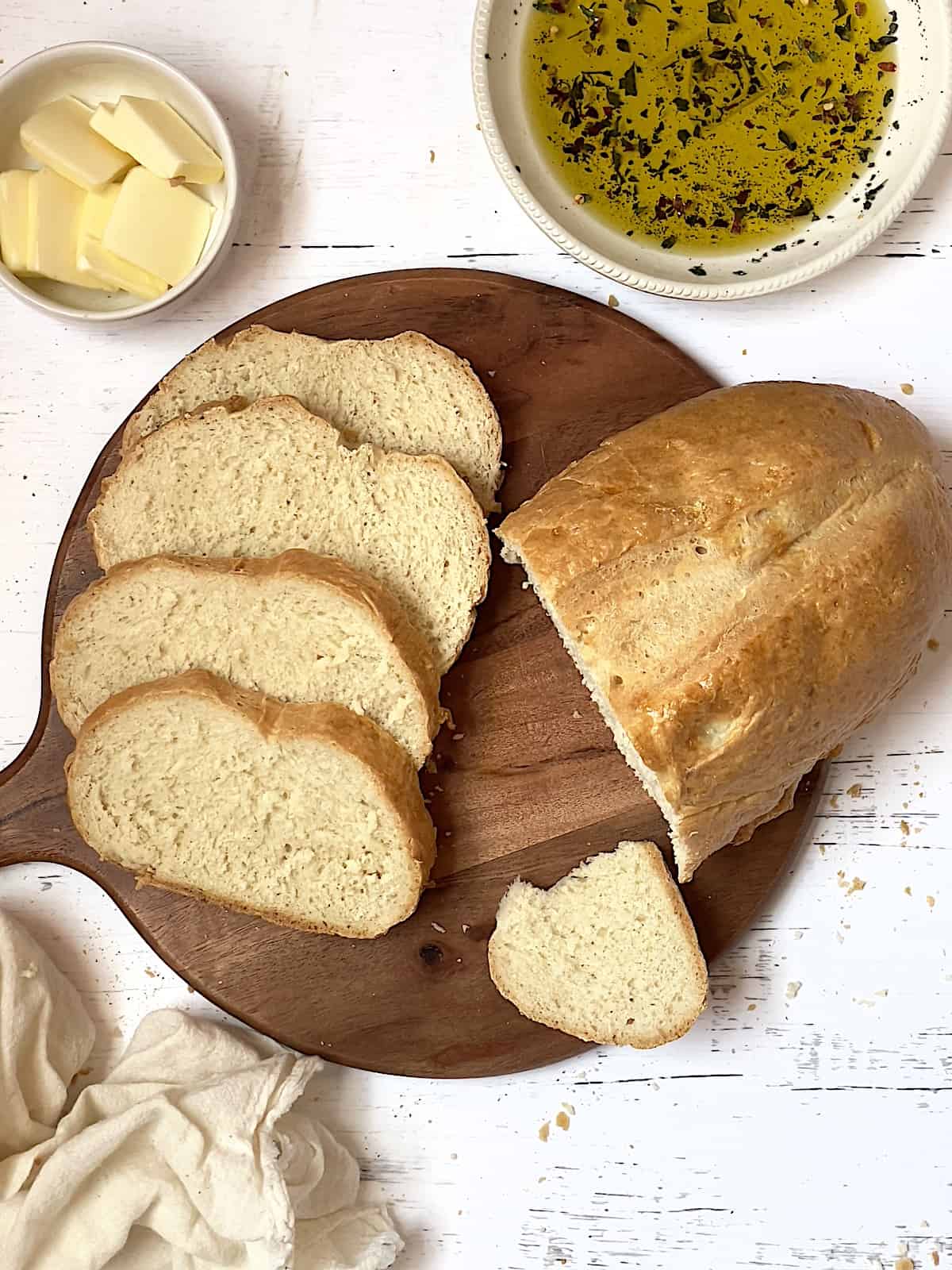 sliced bread machine Italian bread on a cutting board