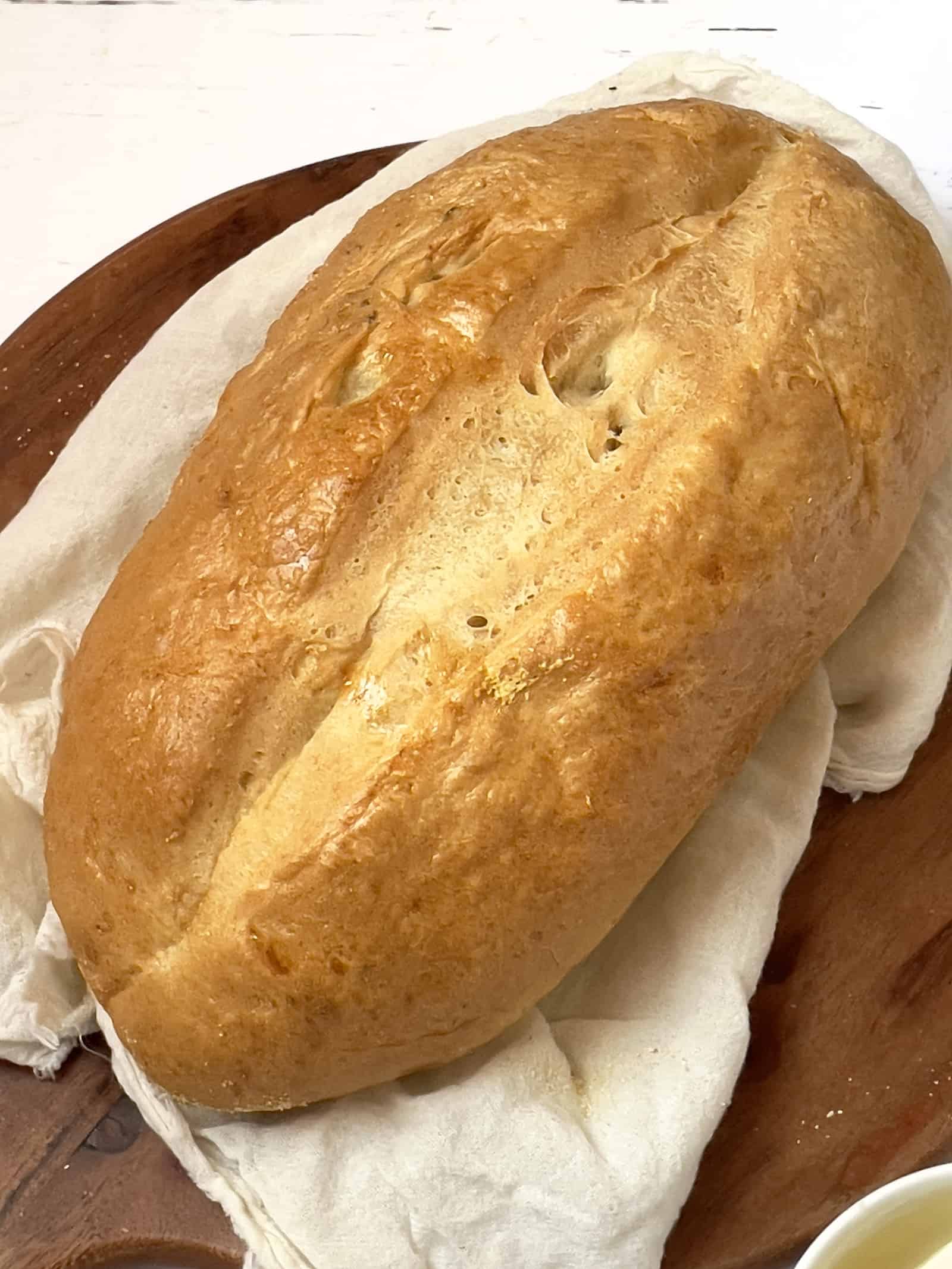 loaf of italian bread on a cutting board 