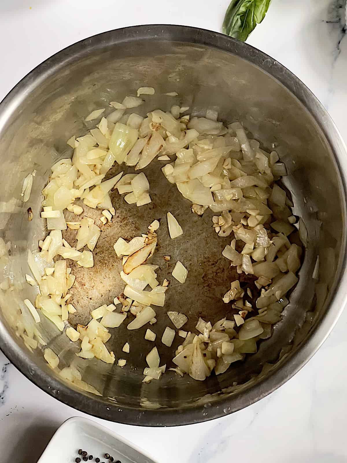 onions and garlic in an inner pot