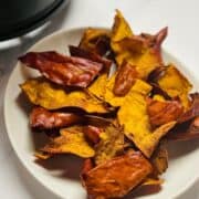pumpkin chips on a white plate