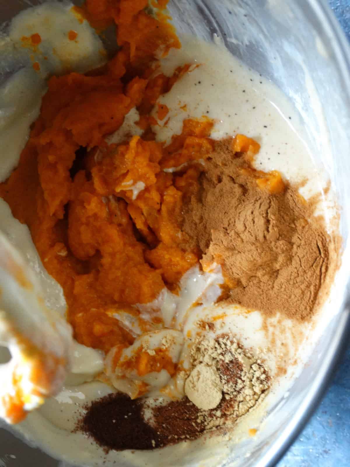 pumpkin cheesecake filling in a stand mixer