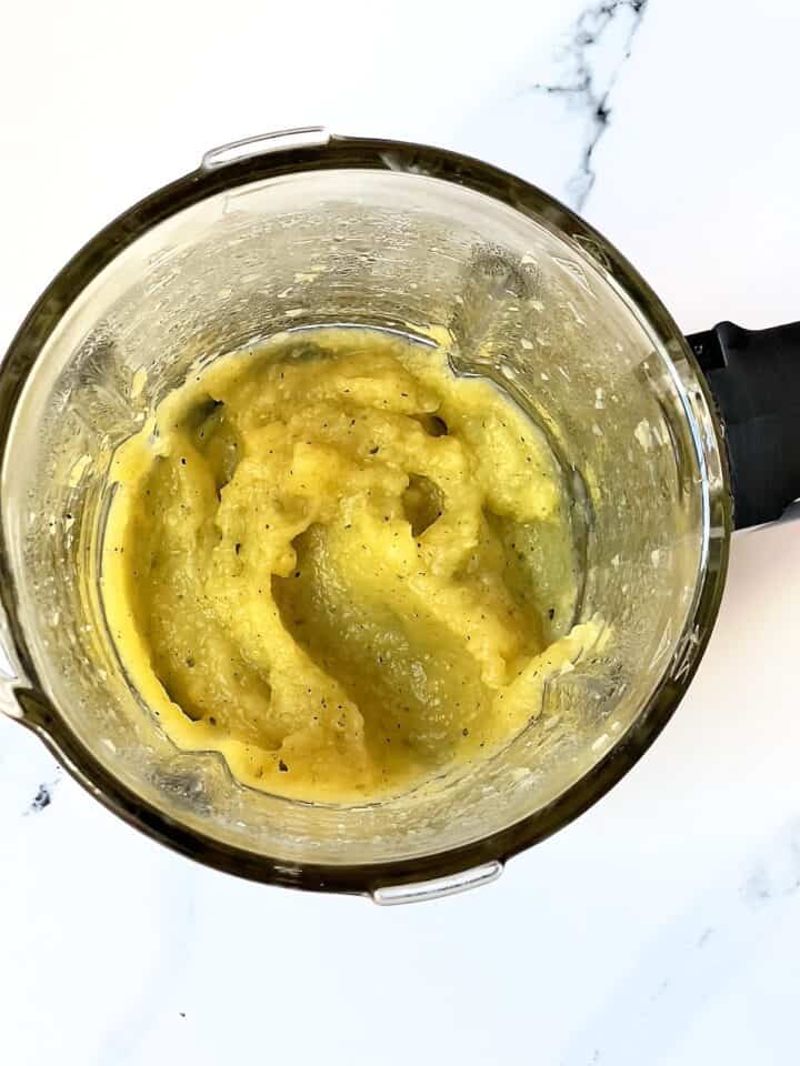 acorn squash pureed in a blender