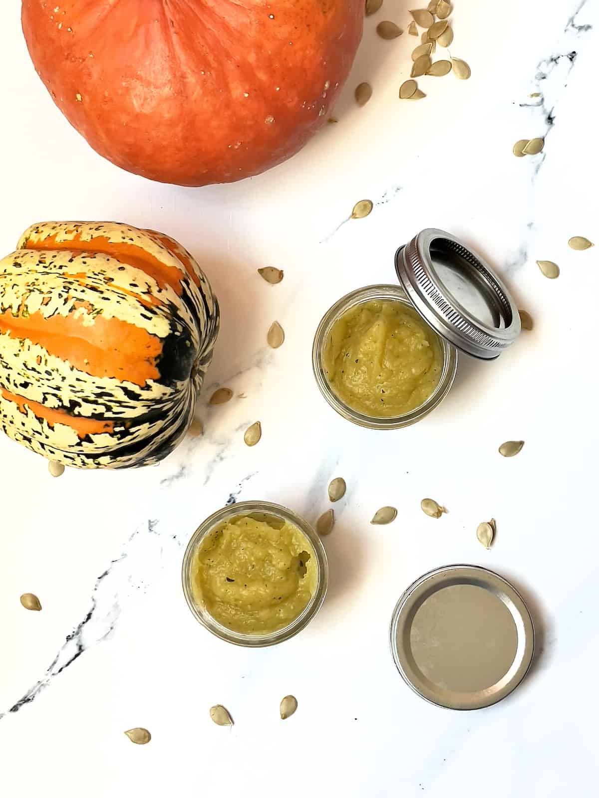 acorn squash puree in 2 small mason jars
