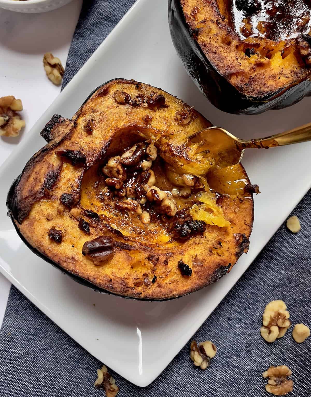 acorn squash being eaten with a fork