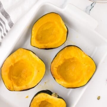 instant pot acorn squash on a serving tray