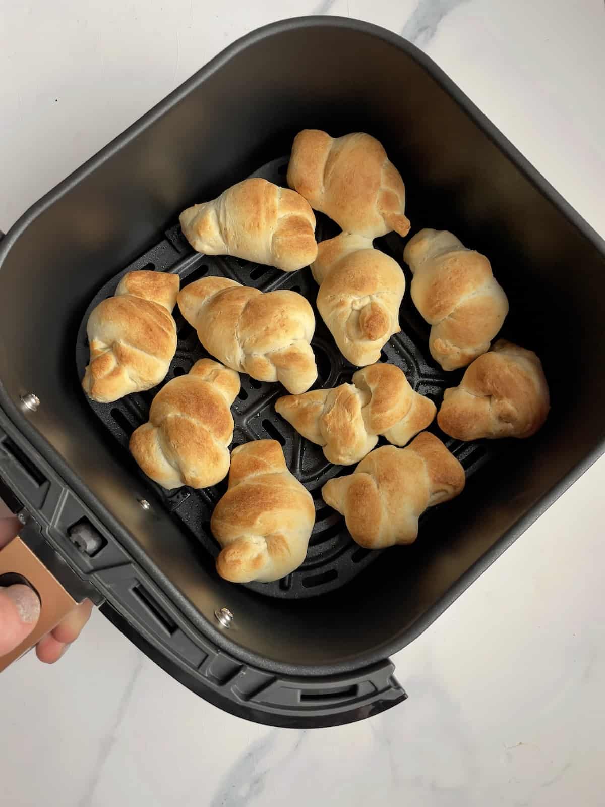 cooked garlic knots in the air fryer basket