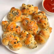 air fried garlic knots on a white plate