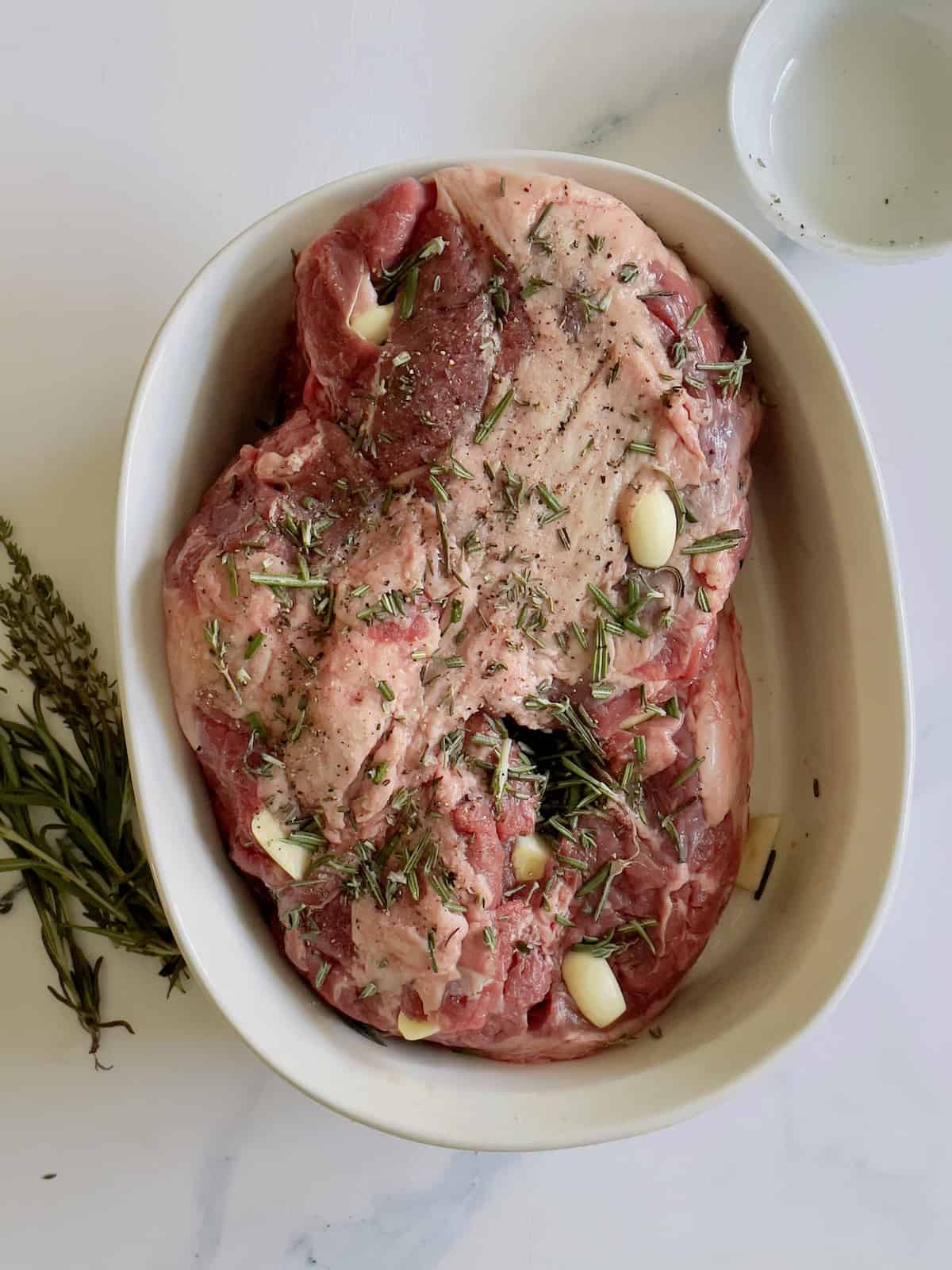 leg of lamb rubbed with an herb mix