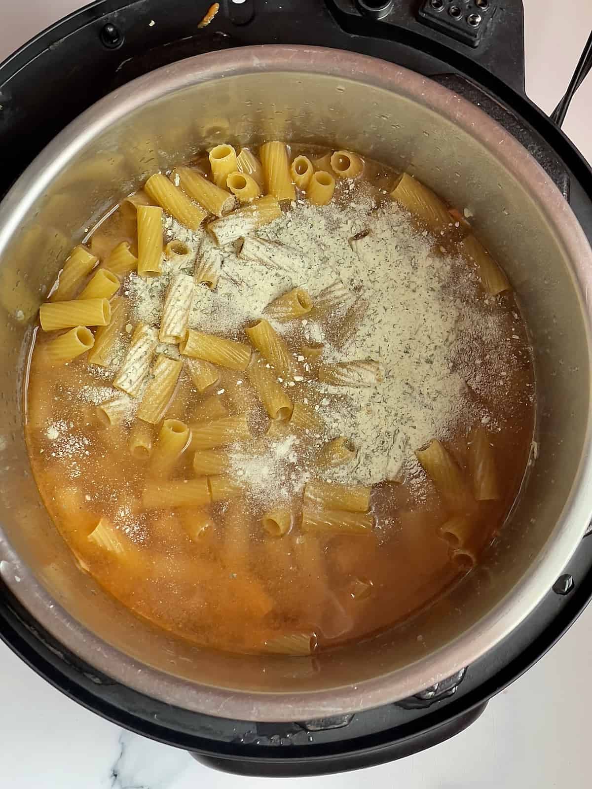 pasta, ranch seasoning and water in an instant pot