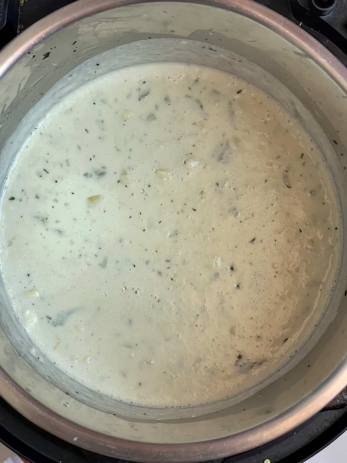 milk and cream simmering in an instant pot