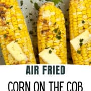 air fried corn on the cob topped with butter and herbs