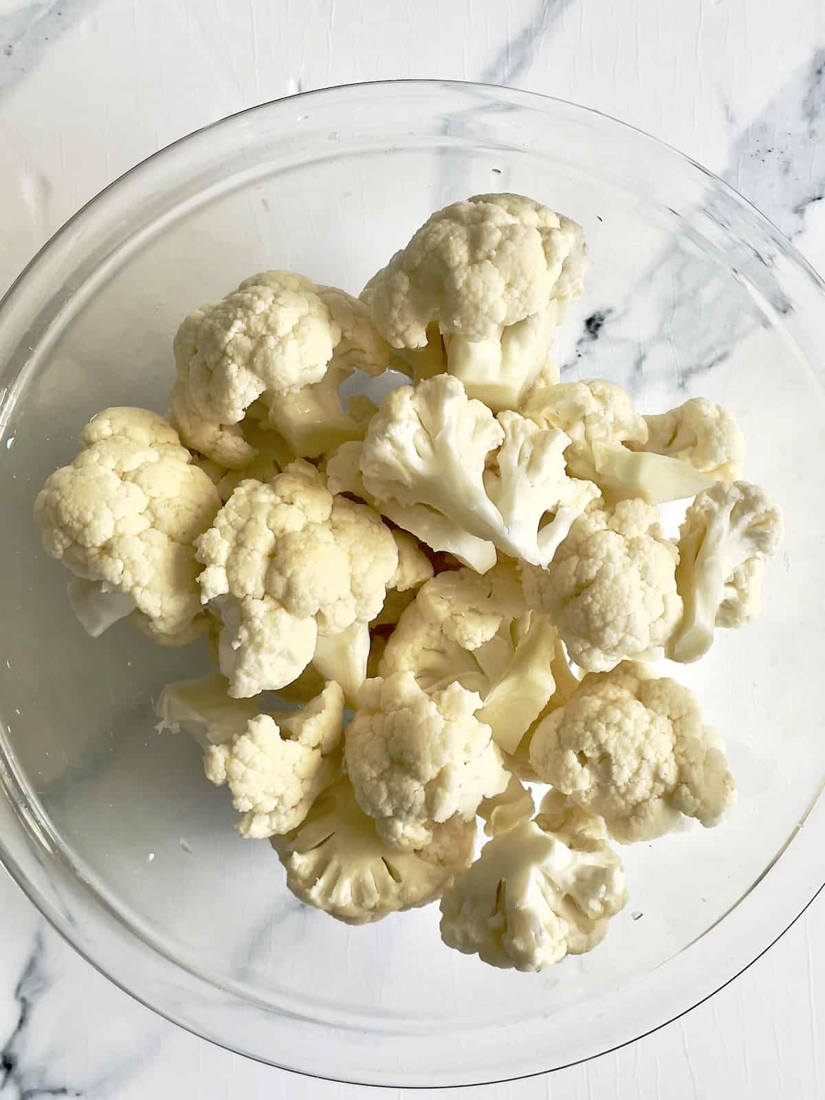 cauliflower florets in a large mixing bowl