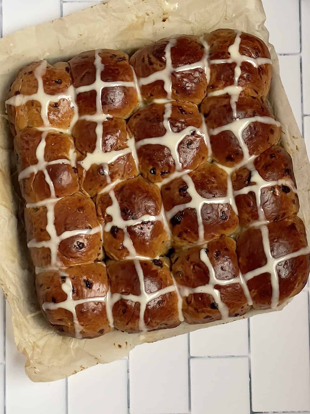 bread machine hot cross buns removed from the pan and resting