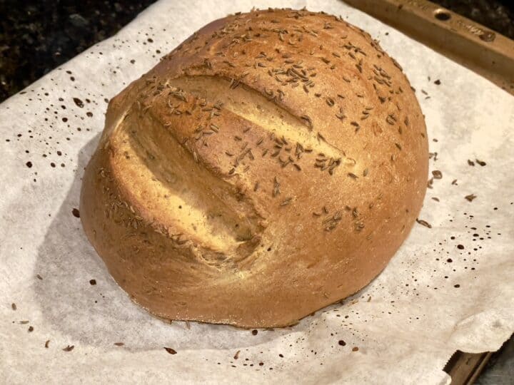 baked rye bread on a baking sheet