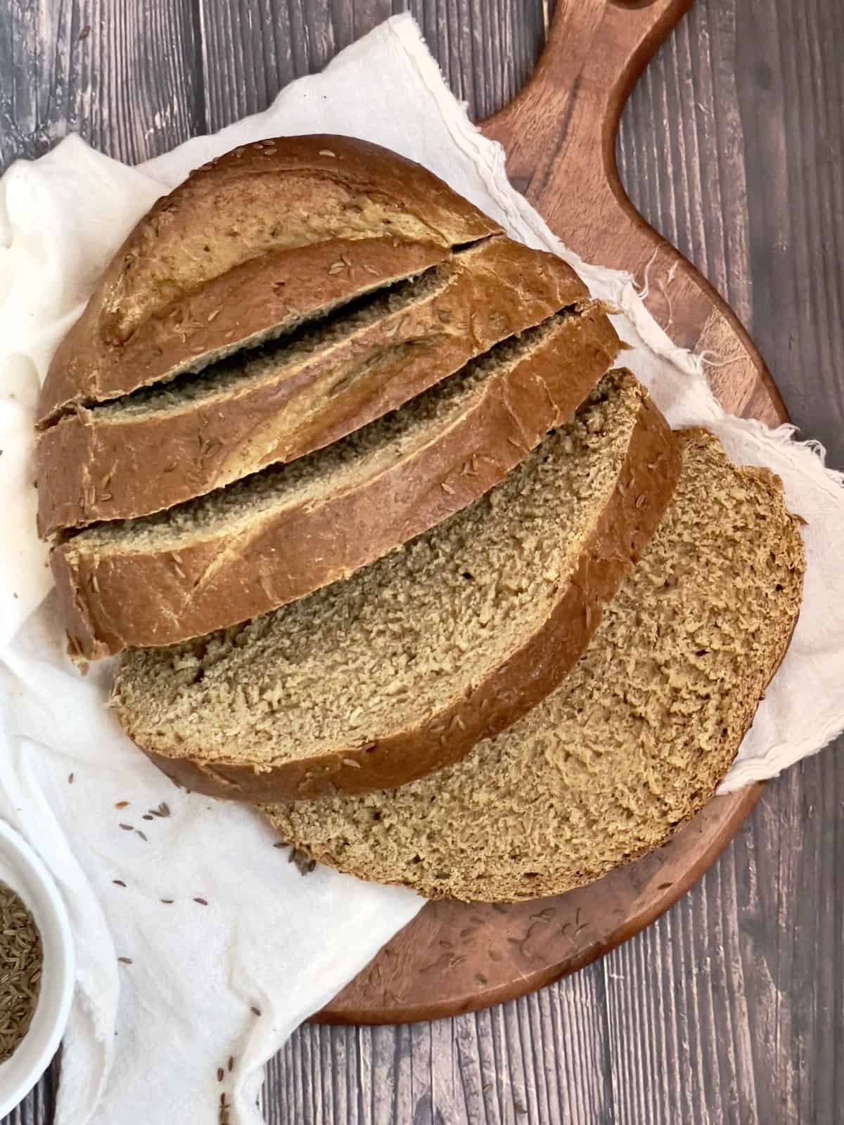 sliced rye bread on a cutting board