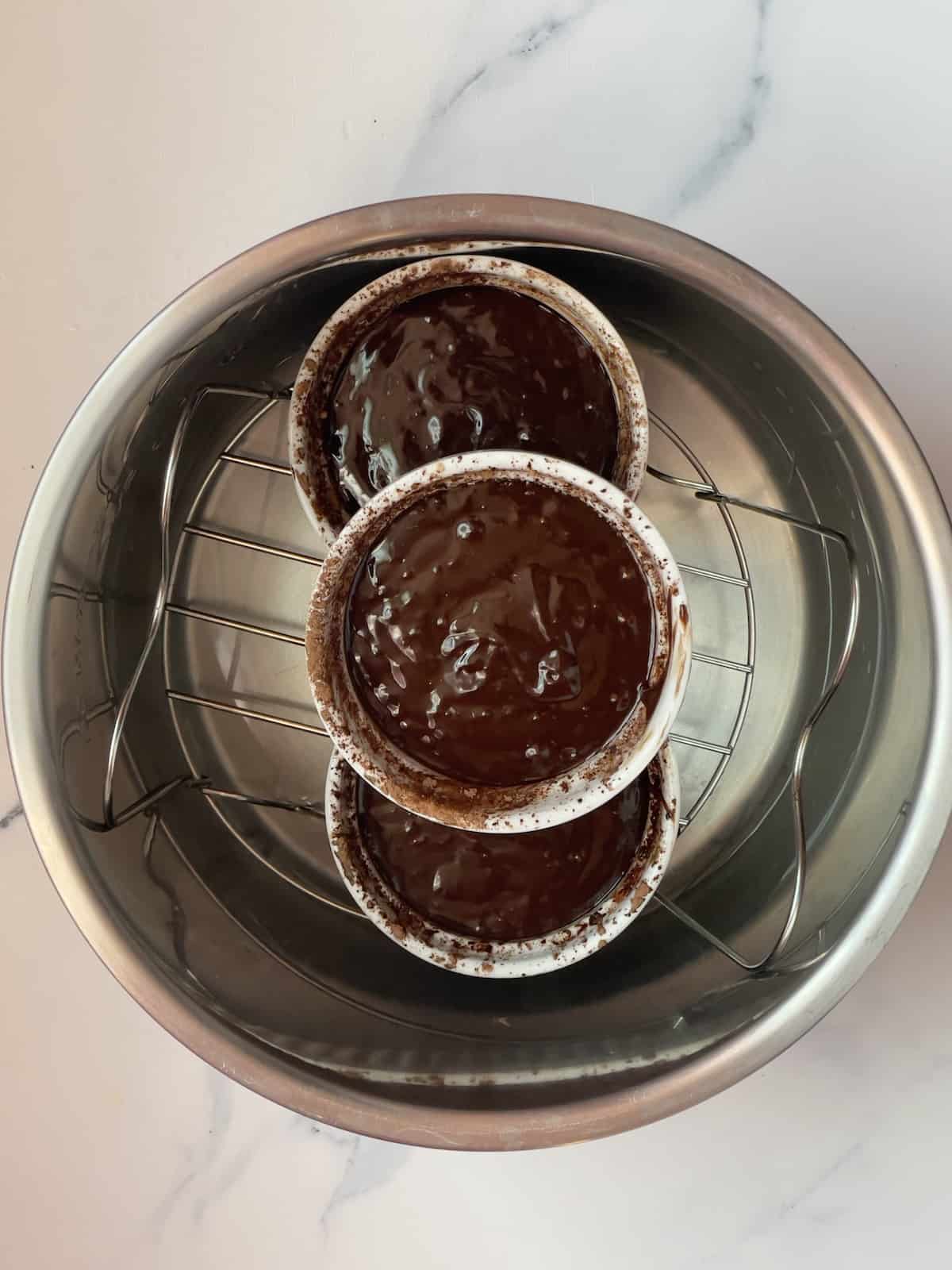 lava cakes inside the inner pot of a pressure cooker