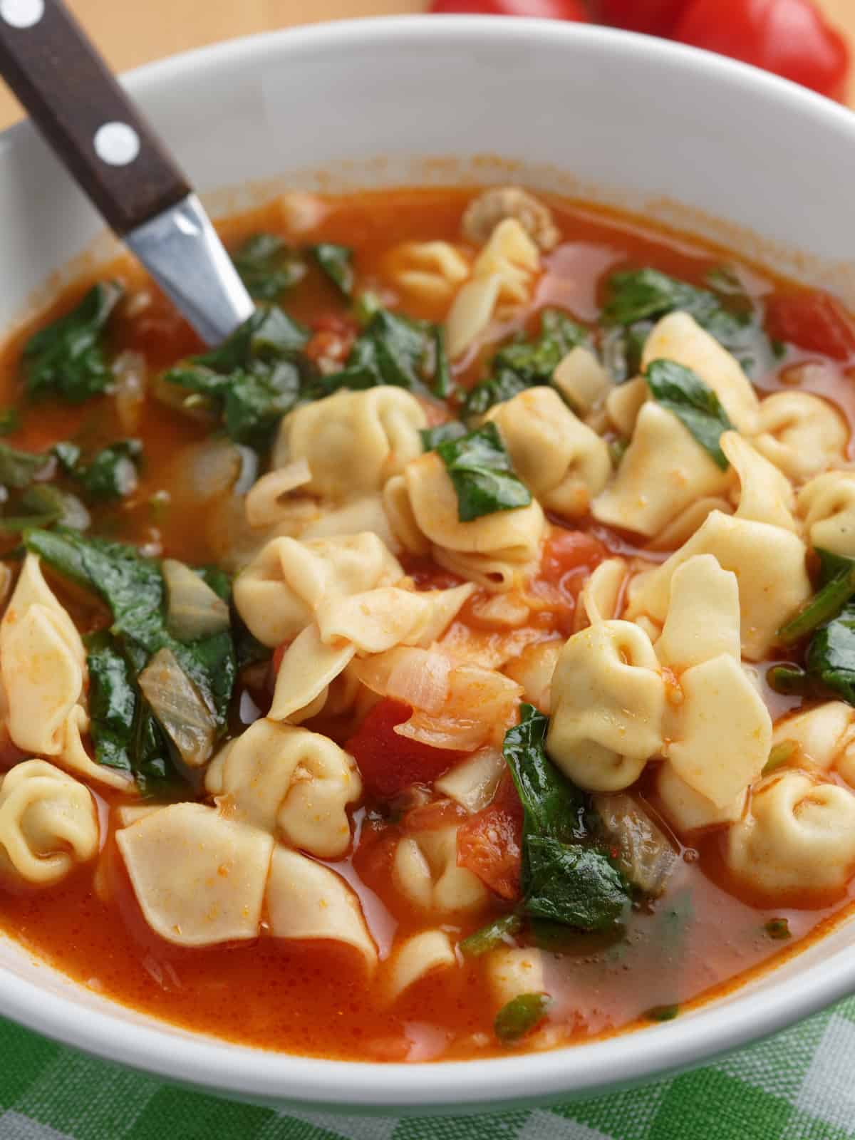 tortellini soup in a soup bowl