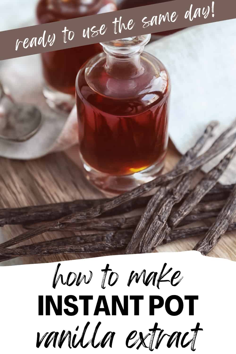 instant pot vanilla extract in a glass jar surrounded by vanilla beans