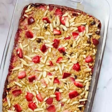 baked strawberry oatmeal in a glass dish