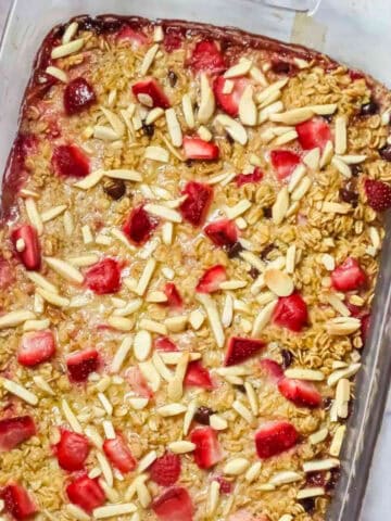 baked strawberry oatmeal in a glass dish