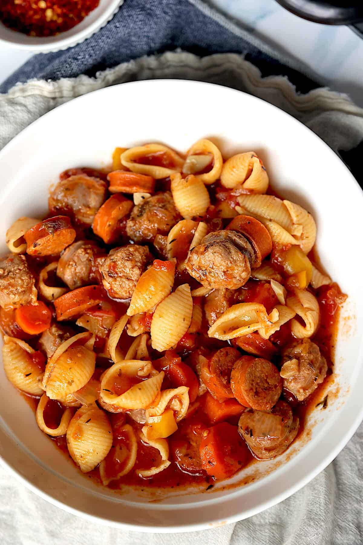 slow cooker italian sausage in a white bowl