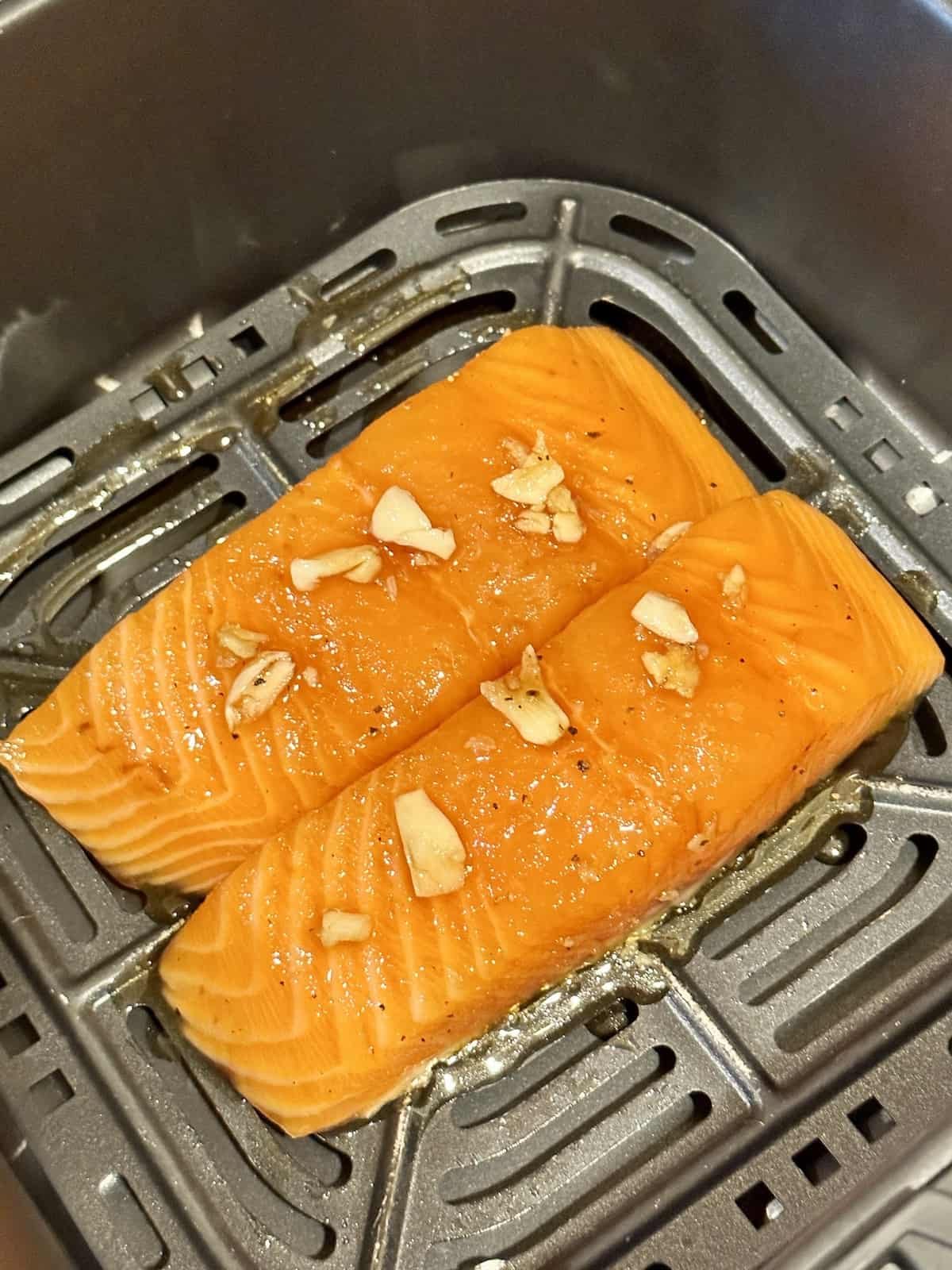 salmon in an air fryer basket