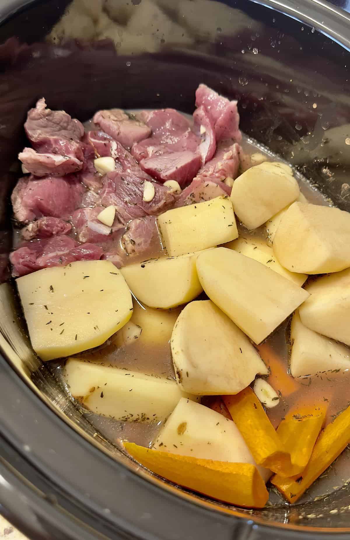 lamb stew with vegetables in the slow cooker