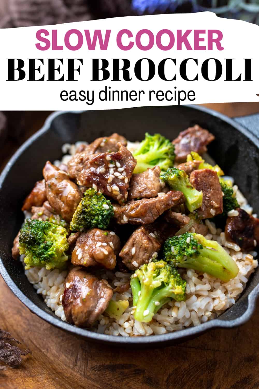crock pot beef and broccoli served over rice in a bowl for pinterest image