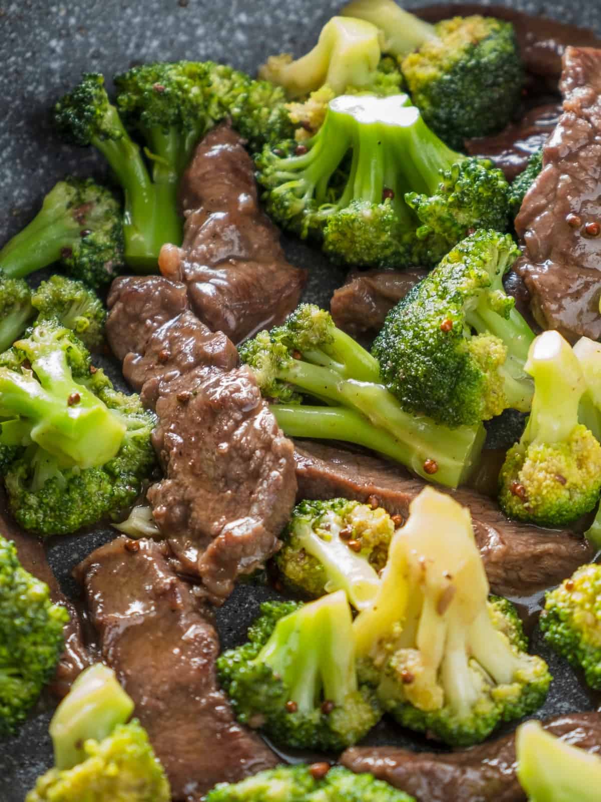 close up of beef and broccoli in a bowl