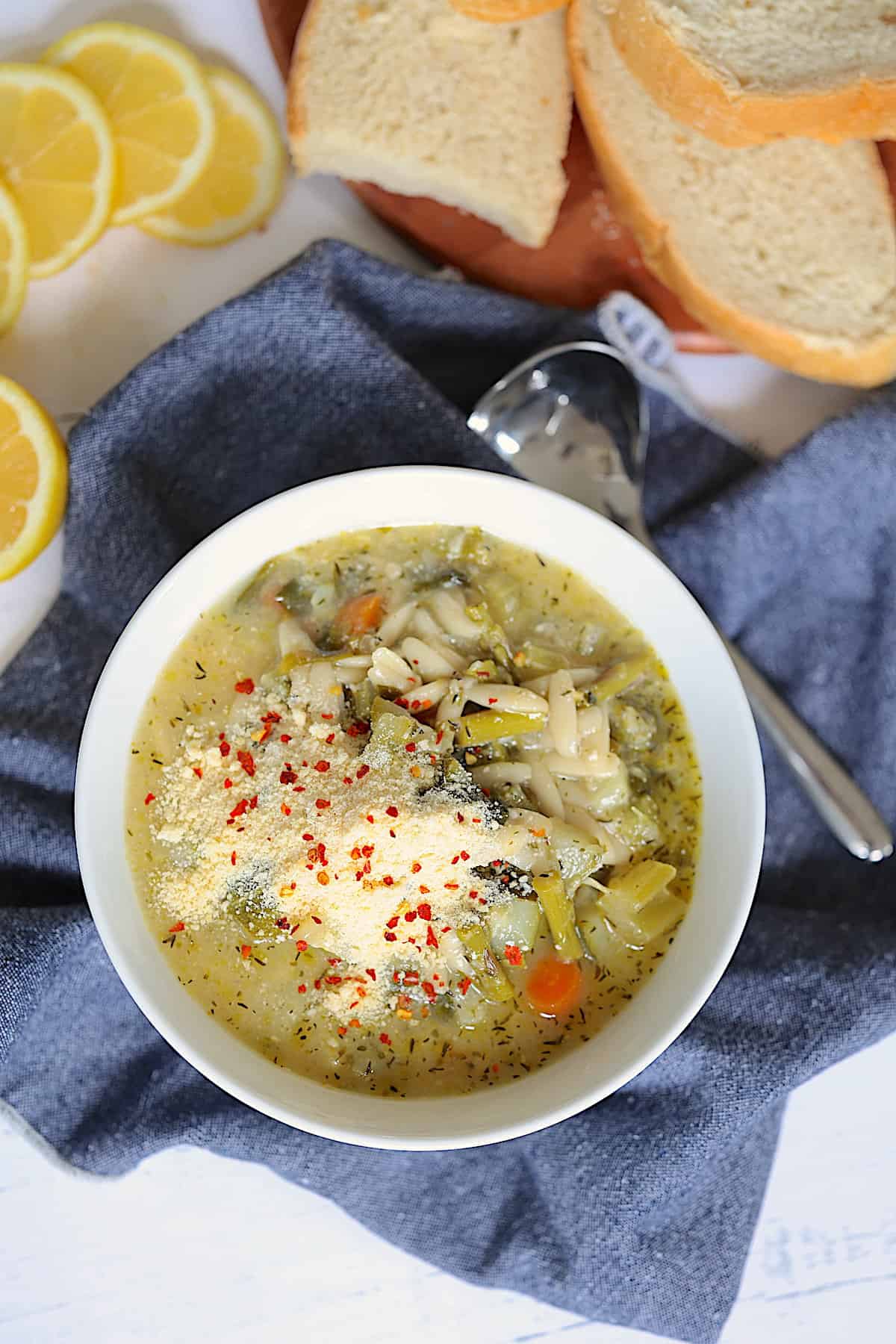 pressure cooked garden vegetable soup topped with parmesan cheese and red pepper flakes