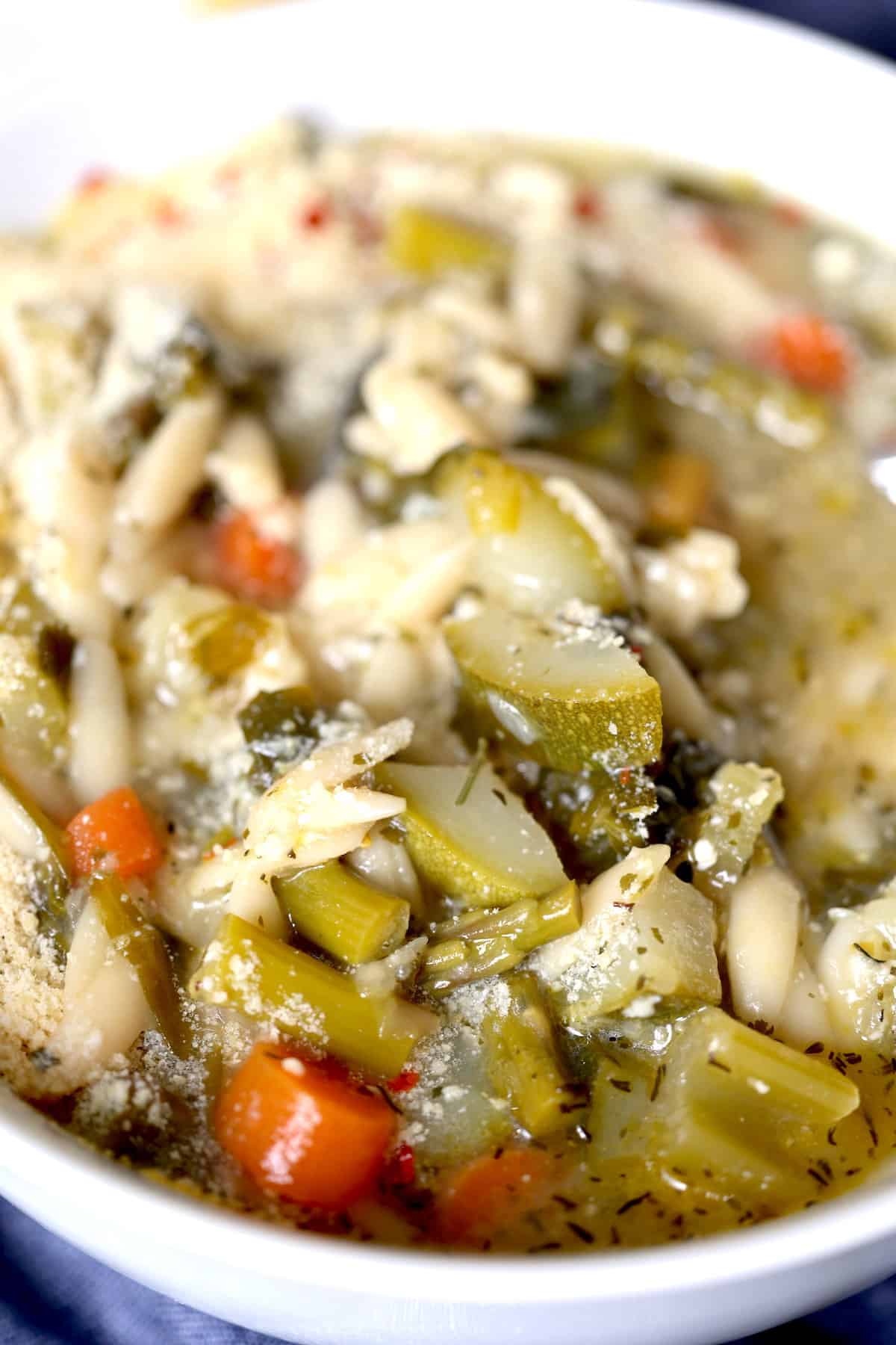 close up of vegetables in a soup bowl