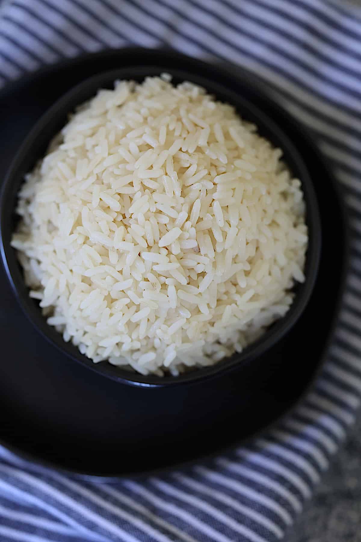 close up of instant pot parboiled white rice in a black bowl