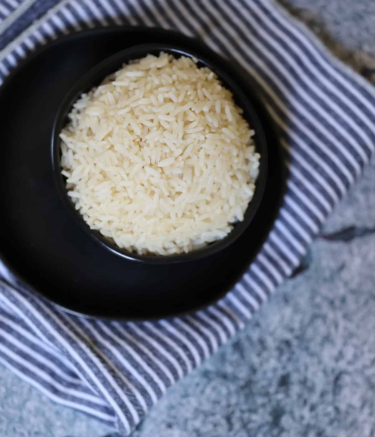 instant pot parboiled rice in a black bowl