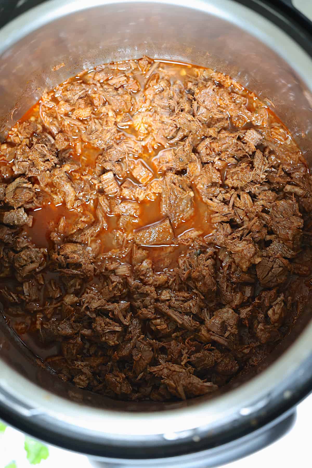 shredded mexican beef in a pressure cooker