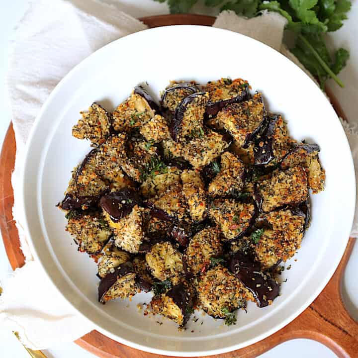 air fried eggplant cubes in a white bowl