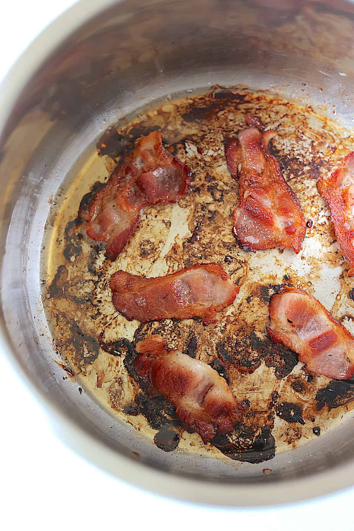 bacon cooking in the pressure cooker