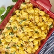 chicken tortellini baked in a casserole with spinach