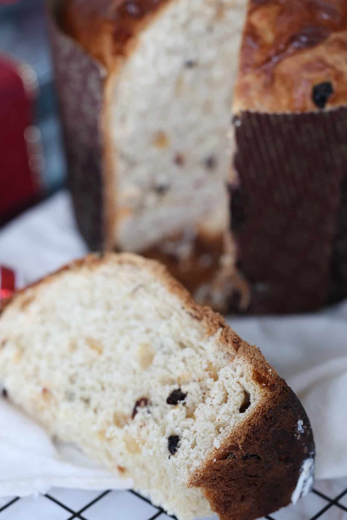 panettone bread made in a bread maker sliced and on a serving dish